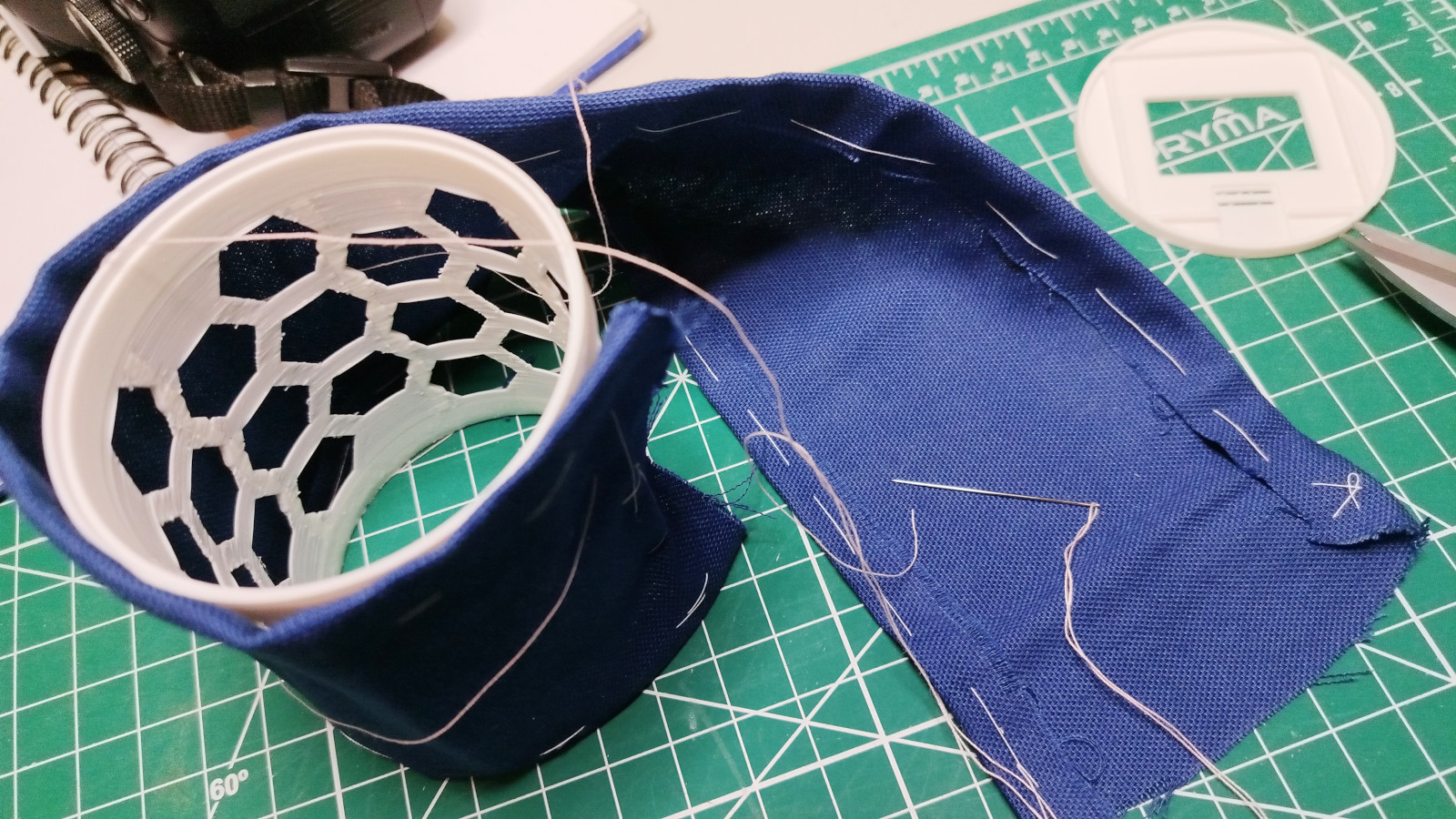 Sewing the fabric around the cylinder